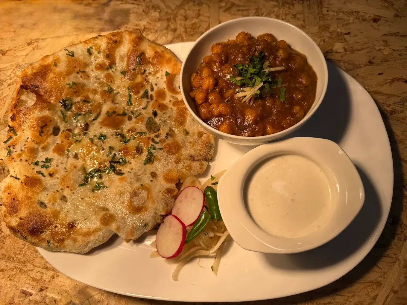 Fresh cheese naan bread at Naan Tale Ramsay Calgary